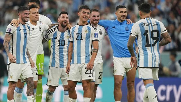Argentina's Lionel Messi, 3rd left, celebrates with team mates after the World Cup semifinal soccer match between Argentina and Croatia at the Lusail Stadium in Lusail, Qatar, Tuesday, Dec. 13, 2022. (AP Photo/Martin Meissner)