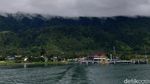 Magis Danau Toba Kala Kabut Mulai Menghilang