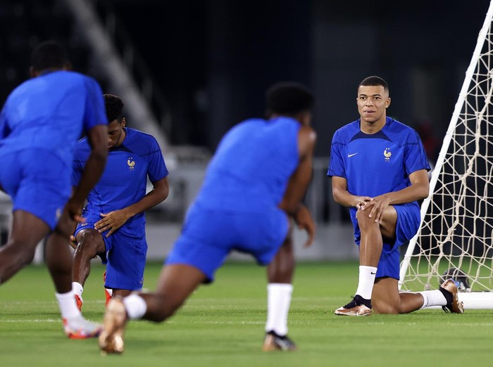 DOHA, QATAR - DECEMBER 13: Player of France stretches during the France Training Session at Al Sadd SC on December 13, 2022 in Doha, Qatar. (Photo by Mohamed Farag/Getty Images)