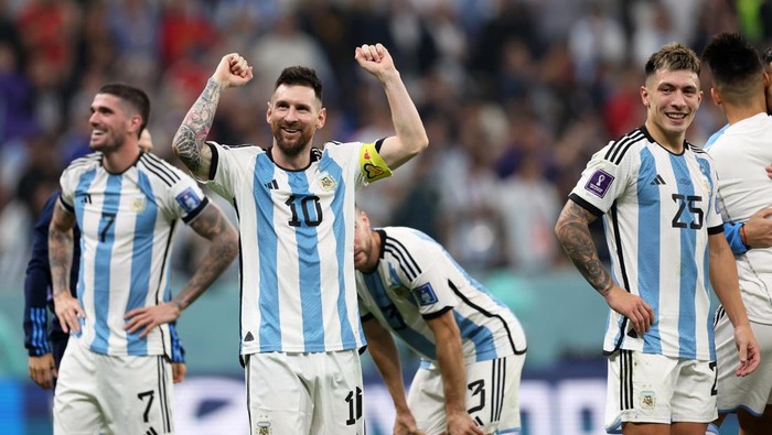 LUSAIL CITY, QATAR - DECEMBER 13:  Lionel Messi of Argentina celebrates the teams 3-0 victory in the FIFA World Cup Qatar 2022 semi final match between Argentina and Croatia at Lusail Stadium on December 13, 2022 in Lusail City, Qatar. (Photo by Clive Brunskill/Getty Images)