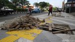 Lubang dan Puing-puing di Trotoar Jalan Margonda