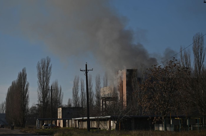 KHERSON, UKRAINE - DECEMBER 14: A view of the building hit by a missile attack in the southern part of Kherson, Ukraine, on December 14, 2022. A month after Russian withdrawal, the Ukrainian city of Kherson and the surrounding villages are daily bombarded by Russian troops from the left bank of the Dnieper. (Photo by Artur Widak/Anadolu Agency via Getty Images)