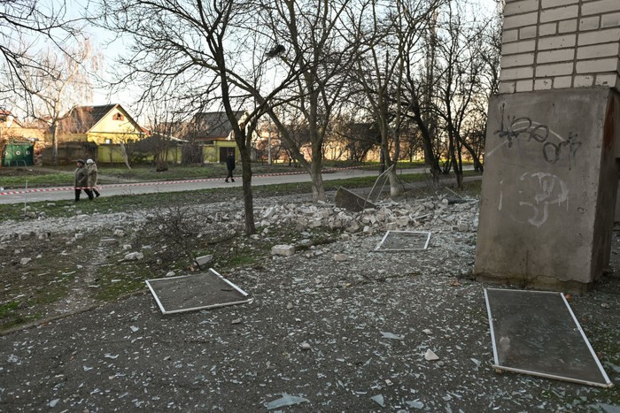 1245602697 KHERSON, UKRAINE - DECEMBER 14: A view of the building hit by a missile attack in the southern part of Kherson, Ukraine, on December 14, 2022. A month after Russian withdrawal, the Ukrainian city of Kherson and the surrounding villages are daily bombarded by Russian troops from the left bank of the Dnieper. (Photo by Artur Widak/Anadolu Agency via Getty Images)