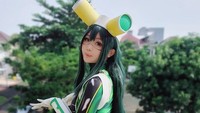 Saat jadi Tsuyu Asui, Clarissa Punipun tampil dengan kostum hijau-hitam ketat dengan sarung tangan putih dan bagian kepala ditambah hiasan seperti mata kodok. (Foto: dok Instagram)