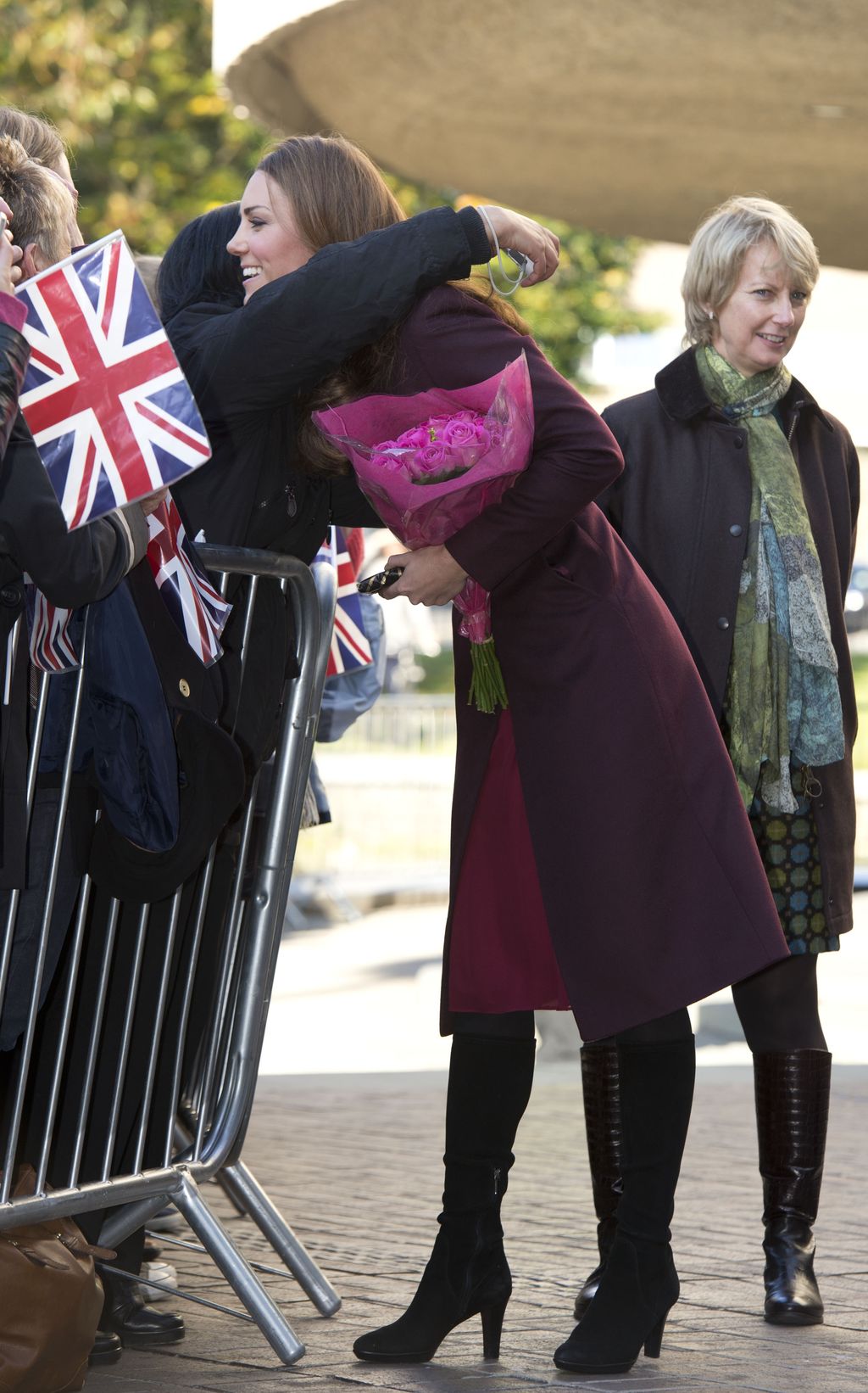 NEWCASTLE UPON TYNE, ENGLAND - OCTOBER 10: Catherine, Duchess of Cambridge hugs a well-wisher as she visits Newcastle Civic Centre, on October 19, 2012 in Newcastle Upon Tyne, United Kingdom. (Photo by Paul Edwards - WPA Pool/Getty Images)