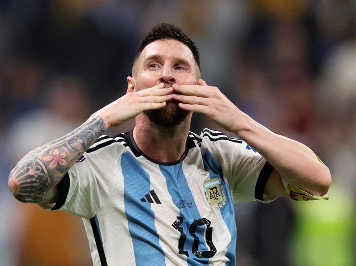 LUSAIL CITY, QATAR - DECEMBER 13: Lionel Messi celebrates after their sides third goal by Julian Alvarez of Argentina (not pictured) during the FIFA World Cup Qatar 2022 semi final match between Argentina and Croatia at Lusail Stadium on December 13, 2022 in Lusail City, Qatar. (Photo by Clive Brunskill/Getty Images)