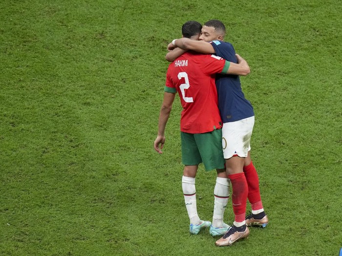 AL KHOR, QATAR - DECEMBER 14: Achraf Hakimi of Morocco and Kylian Mbappe of France look on after the FIFA World Cup Qatar 2022 semi final match between France and Morocco at Al Bayt Stadium on December 14, 2022 in Al Khor, Qatar. (Photo by Manuel Reino Berengui/DeFodi Images via Getty Images)