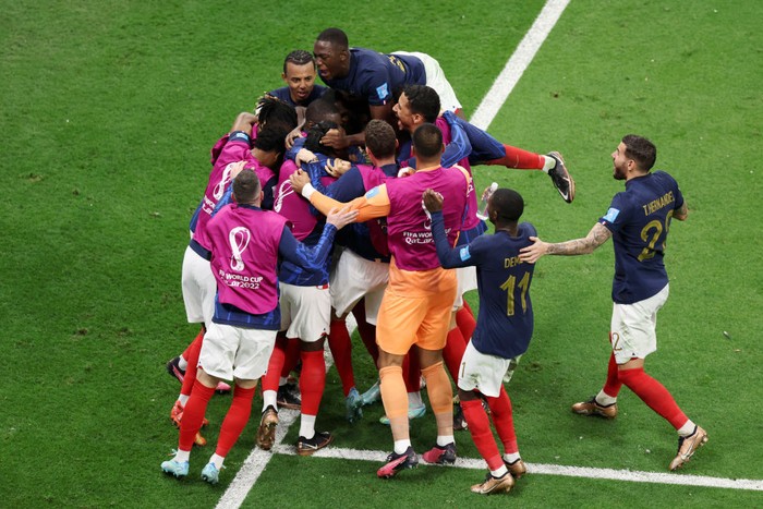 AL KHOR, QATAR - DECEMBER 14: Randal Kolo Muani of France celebrates with teammates after scoring the teams second goal during the FIFA World Cup Qatar 2022 semi final match between France and Morocco at Al Bayt Stadium on December 14, 2022 in Al Khor, Qatar. (Photo by Clive Brunskill/Getty Images)