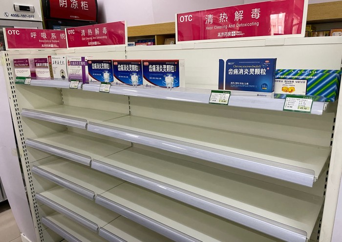 This photo shows an almost empty shelf of cold medicine at a pharmacy amid the Covid-19 pandemic in Beijing on December 15, 2022. (Photo by Yuxuan ZHANG / AFP) (Photo by YUXUAN ZHANG/AFP via Getty Images)