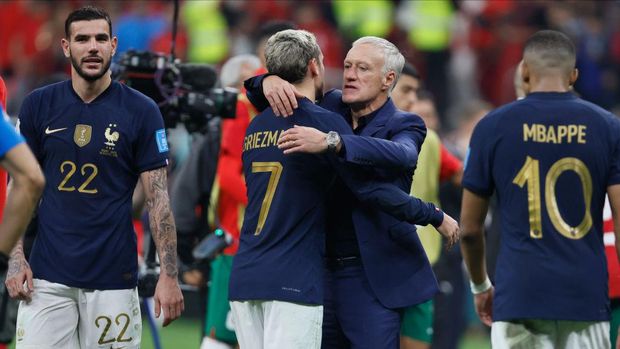 AL KHOR, QATAR - DECEMBER 14: Theo Hernandez,  Didier Deschamps, Head Coach of France and Antoine Griezmann after the FIFA World Cup Qatar 2022 semi final match between France and Morocco at Al Bayt Stadium on December 14, 2022 in Al Khor, Qatar. (Photo by Richard Sellers/Getty Images)