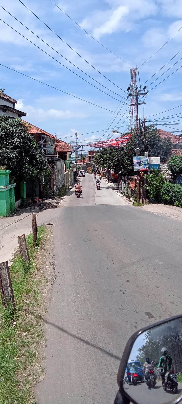 Jl Pabuaran di Kabupaten Bogor yang sudah diperbaiki. (Dok PUPR Kabupaten Bogor)