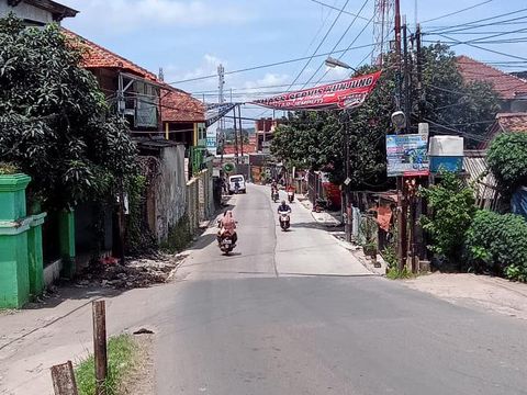 Jl Pabuaran di Kabupaten Bogor yang sudah diperbaiki. (Dok PUPR Kabupaten Bogor)