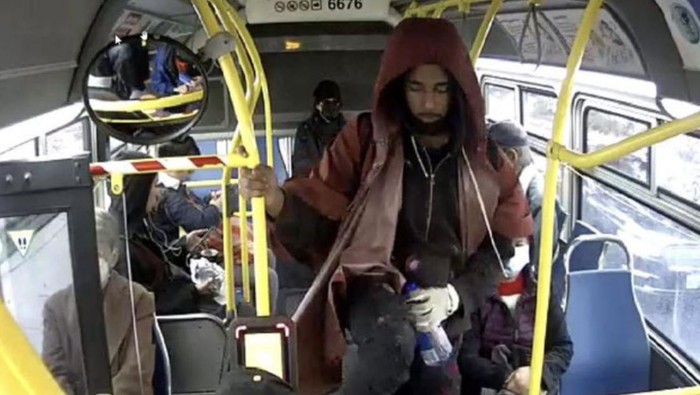 The video released by police shows the woman board the bus with other passengers at a stop at 11.21am. A man trying to get off the bus kicks her in the stomach, sending her flying back as her head strikes a metal railing, the video shows. — Pic from security video courtesy of San Francisco Police Department