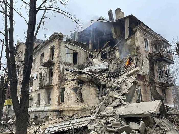 Debris of an apartment building damaged in a Russian rocket attack in Kryvyi Rih, Ukraine, Friday, Dec. 16, 2022. Russian forces launched at least 60 missile strikes across Ukraine on Friday, officials said, reporting explosions in at least four cities. At least two people were killed when a residential building was hit in central Ukraine, while electricity and water services were interrupted in the two largest cities, Kyiv and Kharkiv. (Ukrainian Emergency Service via AP Photo)