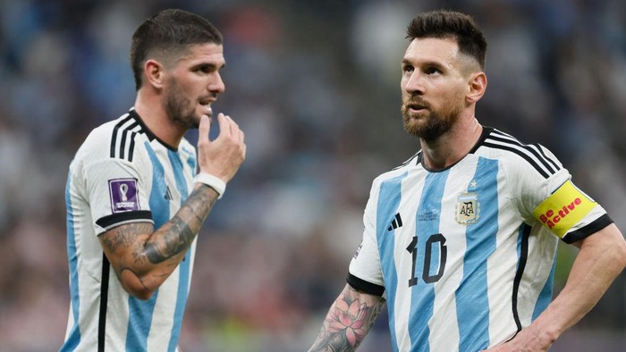 LUSAIL CITY, QATAR - DECEMBER 13: Rodrigo De Paul and Lionel Messi of Argentina during the FIFA World Cup Qatar 2022 semi final match between Argentina and Croatia at Lusail Stadium on December 13, 2022 in Lusail City, Qatar. (Photo by Richard Sellers/Getty Images)