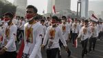Ribuan Buruh Gelar Kirab Hari Migran Internasional di Bundaran HI