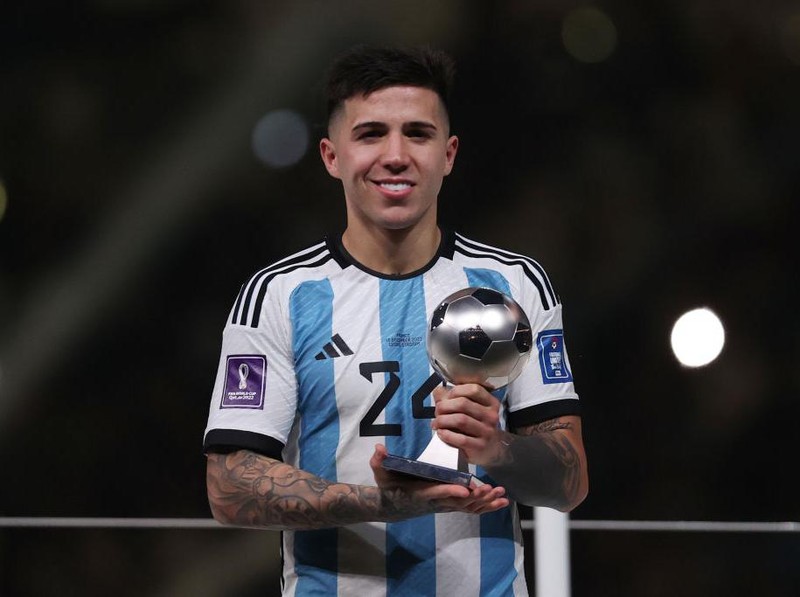 LUSAIL CITY, QATAR - DECEMBER 18: Enzo Fernandez of Argentina poses for a photo with the FIFA Young Player award during the FIFA World Cup Qatar 2022 Final match between Argentina and France at Lusail Stadium on December 18, 2022 in Lusail City, Qatar. (Photo by Julian Finney/Getty Images)