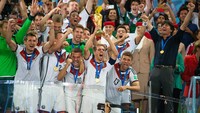 Jerman menjuarai Piala Dunia 2014. Selain piala, Jerman juga mendapatkan uang hadiah sebesar US$ 35 juta (Rp 546 miliar). Simon Bruty/Anychance/Getty Images