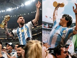 Arak-arakan kepada Messi menyerupai penghormatan yang diterima mendiang Diego Maradona saat membawa Argentina juara Piala Dunia 1986. (Foto: AFP via Getty Images/ANNE-CHRISTINE POUJOULAT)