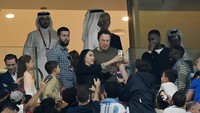 LUSAIL CITY, QATAR - DECEMBER 18: Fans take photos with Elon Musk during the FIFA World Cup Qatar 2022 Final match between Argentina and France at Lusail Stadium on December 18, 2022 in Lusail City, Qatar. (Photo by Dan Mullan/Getty Images)