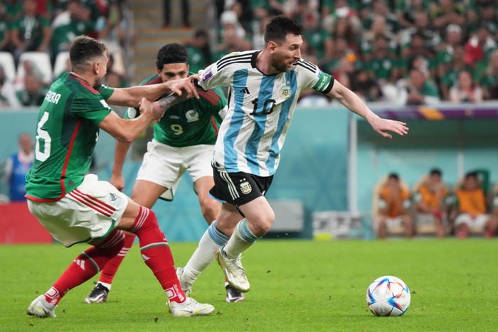 LUSAIL CITY, QATAR - NOVEMBER 26: Lionel Messi of Argentina in action  during the FIFA World Cup Qatar 2022 Group C match between Argentina and Mexico at Lusail Stadium on November 26, 2022 in Lusail City, Qatar. (Photo by Etsuo Hara/Getty Images)