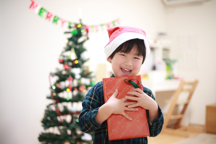 Boy with Christmas gifts