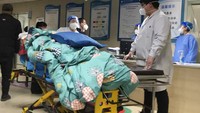 Pasien mulai berdatangan dan memenuhi rumah sakit di penjuru China. (Foto: AP/Dake Kang)