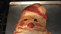 Menghadirkan sosok Santa Claus, kue Natal yang satu ini gagal total. Sosok Santa Claus ini terlihat seperti kakek-kakek yang sedang sedih. Foto: Buzzfeed