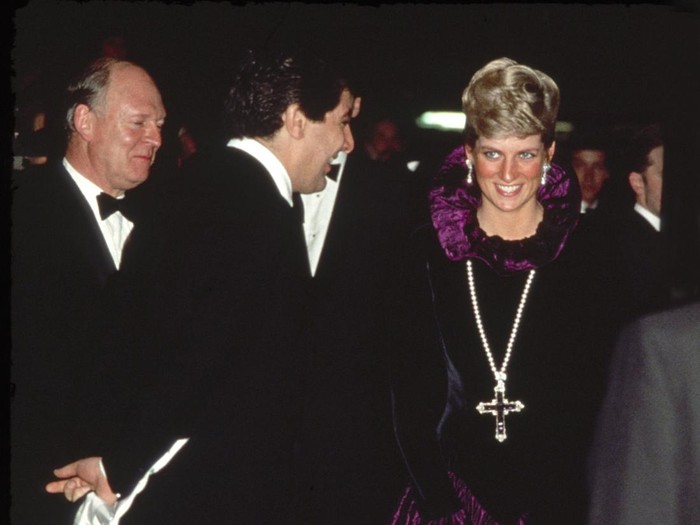 LONDON, UNITED KINGDOM - OCTOBER 27:  Diana, Princess Of Wales, Arriving At A Charity Gala Evening On Behalf Of Birthright At Garrard.  The Princess Is Wearing A Purple Evening Dress With A Gold And Amethyst Crucifix Suspended On A Pearl Rope.  (Photo by Tim Graham Photo Library via Getty Images)
