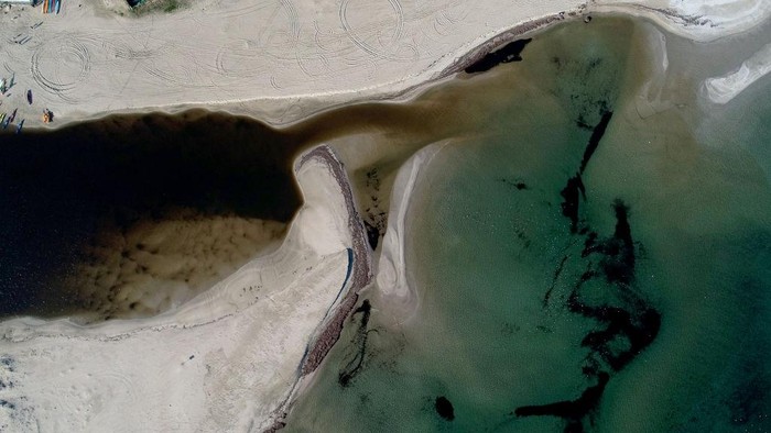 1245822837 KIRKLARELI, TURKIYE - DECEMBER 25: An aerial view of the point where the Lake Mert and Black Sea meets after the rising of streams' water level at Igneada Floodplain Forests, in Kirklareli, Turkiye on December 25, 2022. (Photo by Ozgun Tiran/Anadolu Agency via Getty Images)