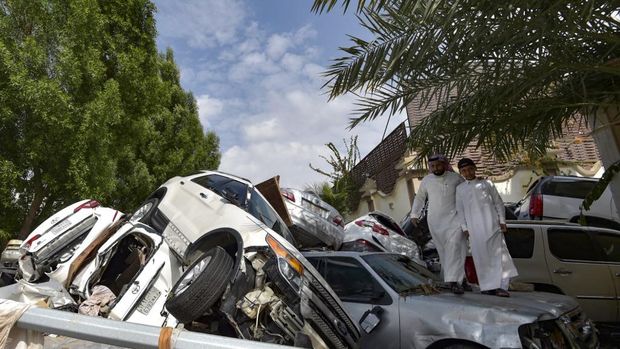 Banjir melanda kota Mekah, Arab Saudi pada Jumat (23/22) pagi. (AFP/AMER HILABI)