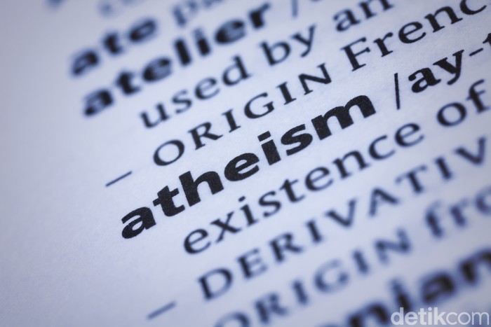 Dictionary word close-up of Atheism. Selective focus and Canon EOS 5D Mark II with MP-E 65mm macro lens.