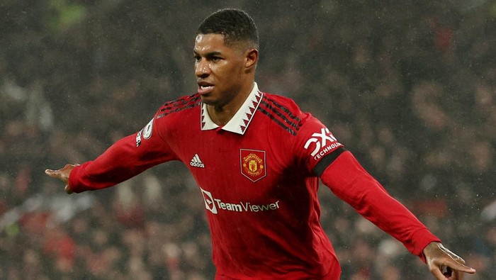 Soccer Football - Premier League - Manchester United v Nottingham Forest - Old Trafford, Manchester, Britain - December 27, 2022  Manchester Uniteds Marcus Rashford celebrates scoring their first goal REUTERS/Phil Noble EDITORIAL USE ONLY. No use with unauthorized audio, video, data, fixture lists, club/league logos or live services. Online in-match use limited to 75 images, no video emulation. No use in betting, games or single club /league/player publications.  Please contact your account representative for further details.