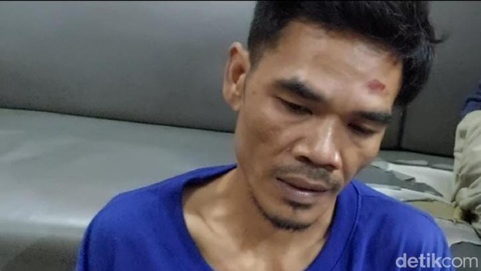 Pelaku pembunuhan suam mantan istri di Batam, Iwan (38). (Alamudin Hamapu/detikSumut)
