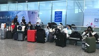Namun awal tahun ini, China sedikit melonggarkan pembatasan visa dengan mengizinkan kerabat langsung warga negara China untuk mengajukan visa reuni keluarga. AP/Emily Wang Fujiyama  