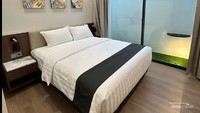 Tempat tidur di The Salt yang nayaman dengan interior ruangan yang menyejukkan mata traveler.