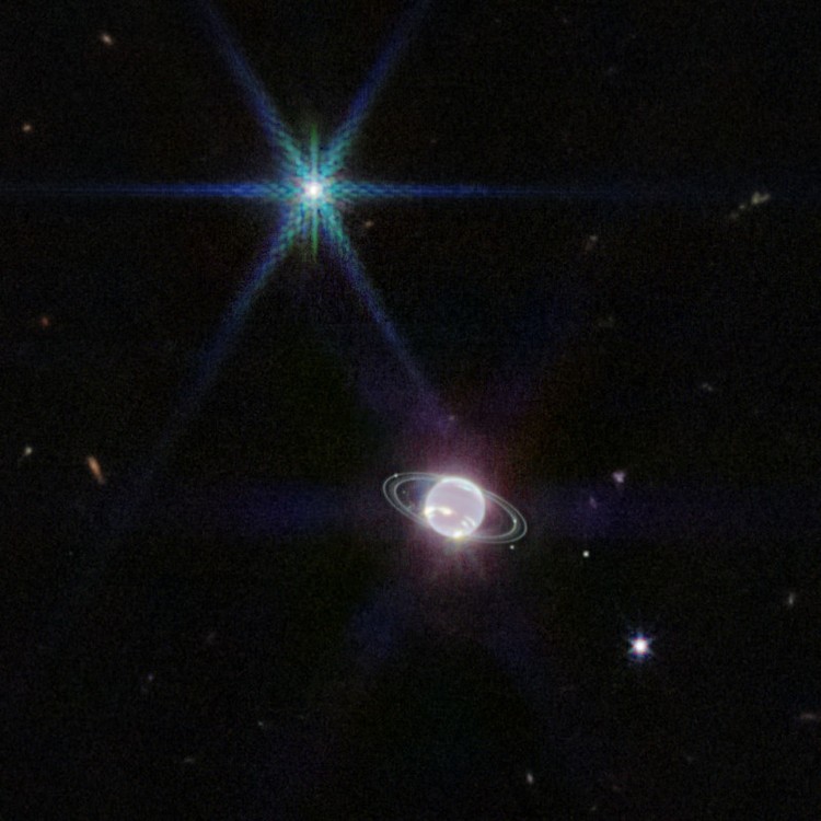This image is dominated by NGC 7469, a luminous, face-on spiral galaxy approximately 90 000 light-years in diameter that lies roughly 220 million light-years from Earth in the constellation Pegasus. Its companion galaxy IC 5283 is partly visible in the lower left portion of this image. This spiral galaxy has recently been studied as part of the Great Observatories All-sky LIRGs Survey (GOALS) Early Release Science program with the NASA/ESA/CSA James Webb Space Telescope, which aims to study the physics of star formation, black hole growth, and feedback in four nearby, merging luminous infrared galaxies. Other galaxies studied as part of the survey include previous ESA/Webb Pictures of the Month II ZW 096 and IC 1623. NGC 7469 is home to an active galactic nucleus (AGN), which is an extremely bright central region that is dominated by the light emitted by dust and gas as it falls into the galaxys central black hole. This galaxy provides astronomers with the unique opportunity to study the relationship between AGNs and starburst activity because this particular object hosts an AGN that is surrounded by a starburst ring at a distance of a mere 1500 light-years. While NGC 7469 is one of the best studied AGNs in the sky, the compact nature of this system and the presence of a great deal of dust have made it difficult for scientists to achieve both the resolution and sensitivity needed to study this relationship in the infrared. Now, with Webb, astronomers can explore the galaxys starburst ring, the central AGN, and the gas and dust in between. Using Webbs MIRI, NIRCam and NIRspec instruments to obtain images and spectra of NGC 7469 in unprecedented detail, the GOALS team has uncovered a number of details about the object. This includes very young star-forming clusters never seen before, as well as pockets of very warm, turbulent molecular gas, and direct evidence for the destruction of small dust grains within a few hundred light-years of the nucleus  proving
