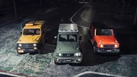 Baru-baru ini DAMD mengumumkan bodykit baru untuk Suzuki Jimny dengan opsi wajah seperti Mercedes-Benz G-Class yang disebut “Little G”. Rencananya tiga bodykit “Little G” baru ini bakal meluncur pada gelaran Tokyo Auto Saloon 2023.  Tiga bodykit Jimny dari DAMD, di antaranya tipe Advance, Traditional dan Aventura. Foto: Damd