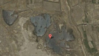 Kota Babylon, Irak lebih terlihat seperti tanah pertanian yang tak ada habisnya daripada kota yang ramai. Foto: Google Maps via Hackread