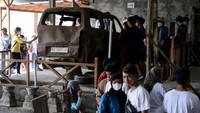 Wisatawan mengunjungi museum Gunung Merapi saat libur akhir tahun, di Cangkringan, Yogyakarta, Kamis (29/12/2022).