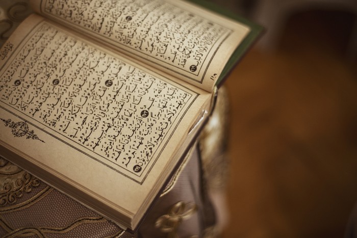 holy book quran black background