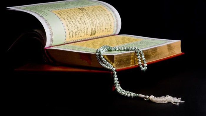holy book quran black background