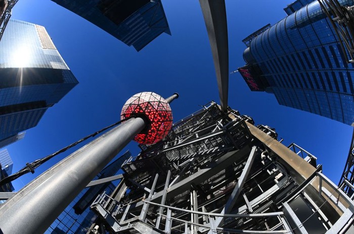 NEW YORK, NEW YORK - DECEMBER 30: The New Year's Eve Ball is illuminated and elevated for a final test ahead of New Year’s Eve on December 30, 2022 in New York City. The Ball is covered with a total of 2,688 Waterford Crystal triangles and illuminated by 32,256 energy efficient LEDs and can display a pallet of more than 16 million.  (Photo by Alexi Rosenfeld/WireImage)