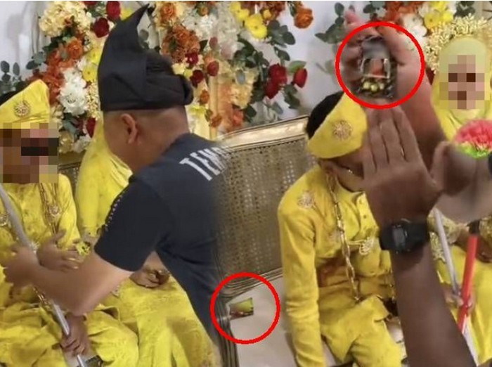 Aksi teman pengantin pria yang memberikan hadiah tidak biasa ketika bersalaman di pelaminan, menjadi sorotan warganet. Aksi teman pengantin pria yang memberikan hadiah tidak biasa ketika bersalaman di pelaminan, menjadi sorotan warganet.