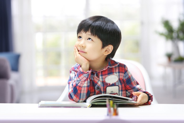Creative smart student thinking about the future