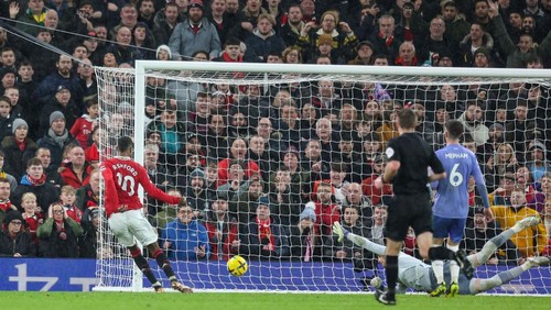 MANCHESTER, ENGLAND - JANUARY 03:  Marcus Rashford of Manchester United scores a goal to make it 3-0 during the Premier League match between Manchester United and AFC Bournemouth at Old Trafford on January 03, 2023 in Manchester, England. (Photo by Robin Jones - AFC Bournemouth/AFC Bournemouth via Getty Images)