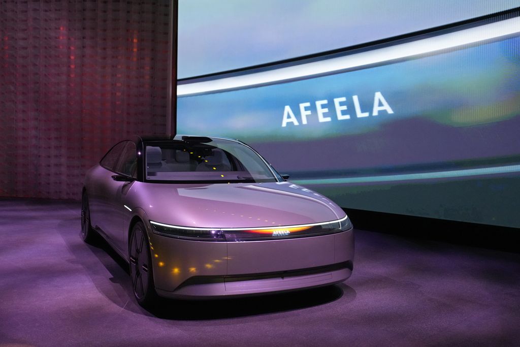 The electric vehicle prototype car Afeela, a joint venture between Sony and Honda, is displayed during a Sony news conference before the start of the CES tech show Wednesday, Jan. 4, 2023, in Las Vegas. (AP Photo/John Locher)