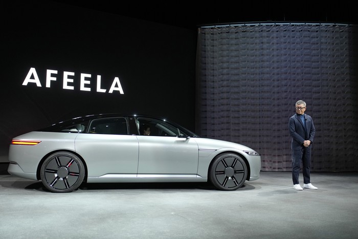The electric vehicle prototype car Afeela, a joint venture between Sony and Honda, is displayed during a Sony news conference before the start of the CES tech show Wednesday, Jan. 4, 2023, in Las Vegas. (AP Photo/John Locher)