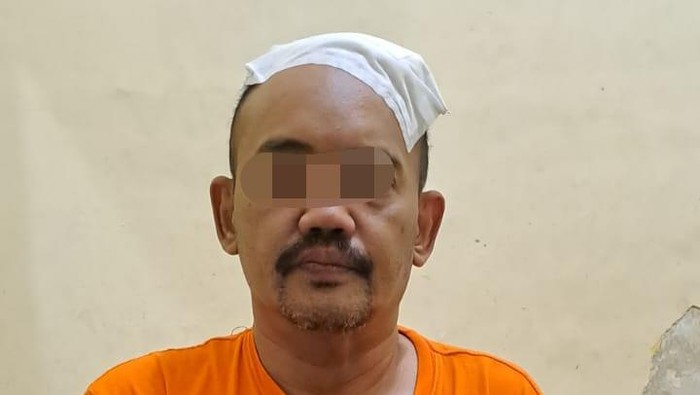 Pelaku perampokan anak dan ibu di Malang saat dikantor polisi