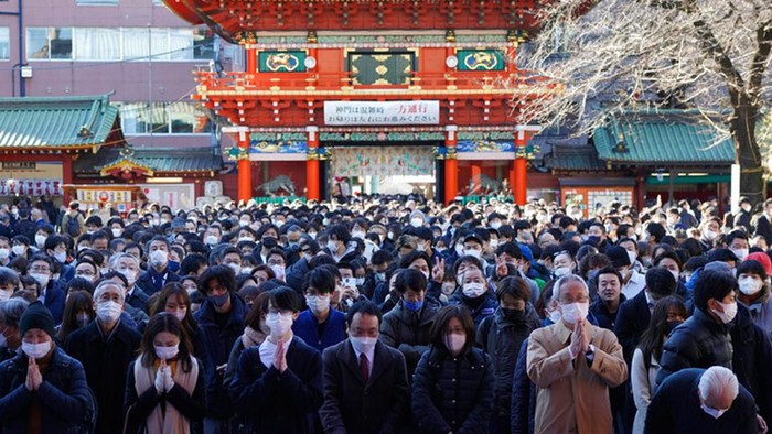 Visitors offer prayers at Kanda Myojin shrine on the first business day of the year Wednesday, Jan. 4, 2023, in Tokyo. (AP Photo/Eugene Hoshiko)